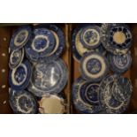 A large collection of 19th century and later blue and white pottery to include plates, bowls, dishes