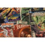 A large collection of modern Marvel / DC / DC Universe comics mostly in plastic wallets to include