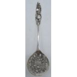 Dutch silver ornate spoon with fruit pierced design, 44.5 grams, 19.5cm long.