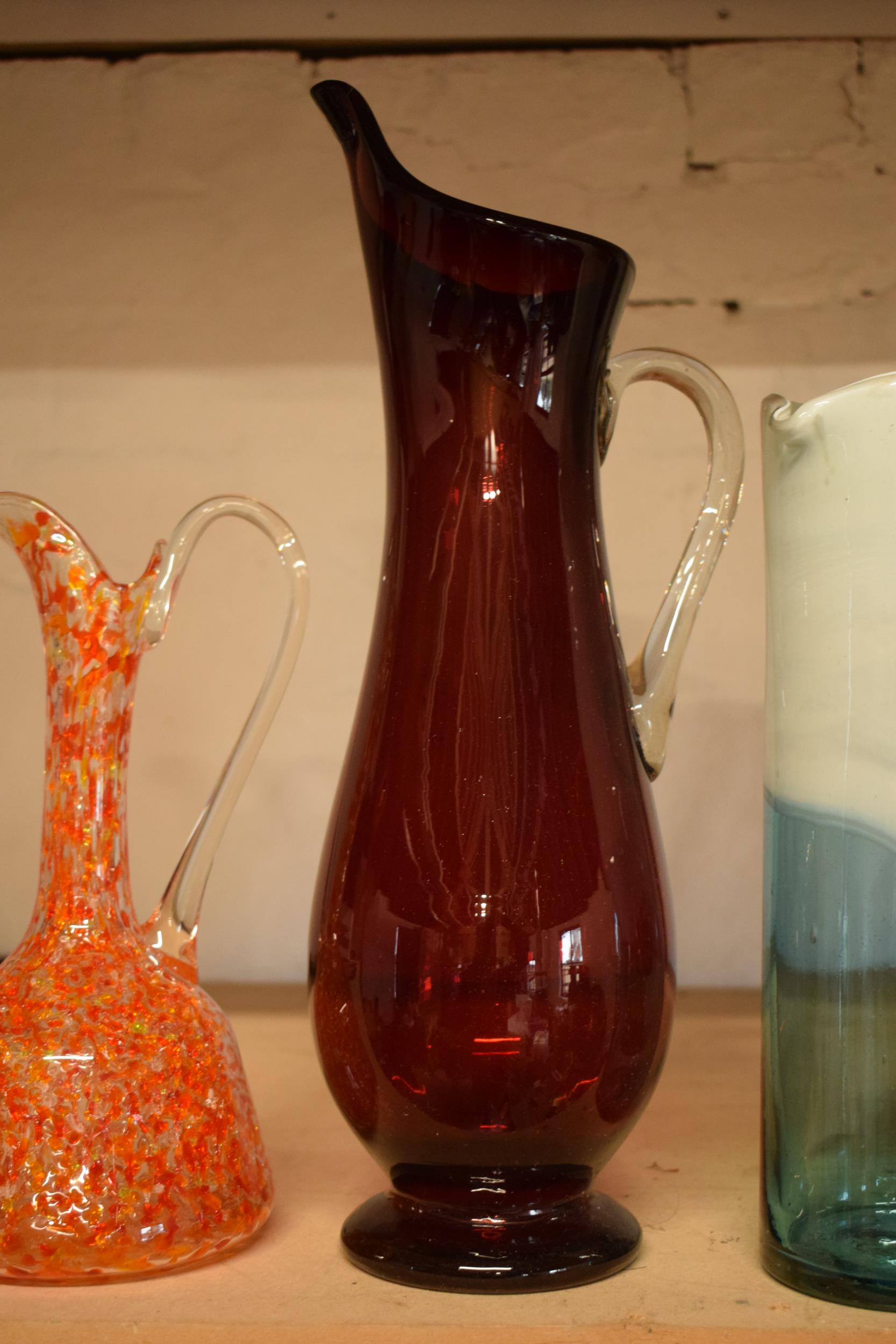 A collection of assorted art / studio glass in the form of jugs (4), tallest 44cm. Condition is - Image 4 of 5