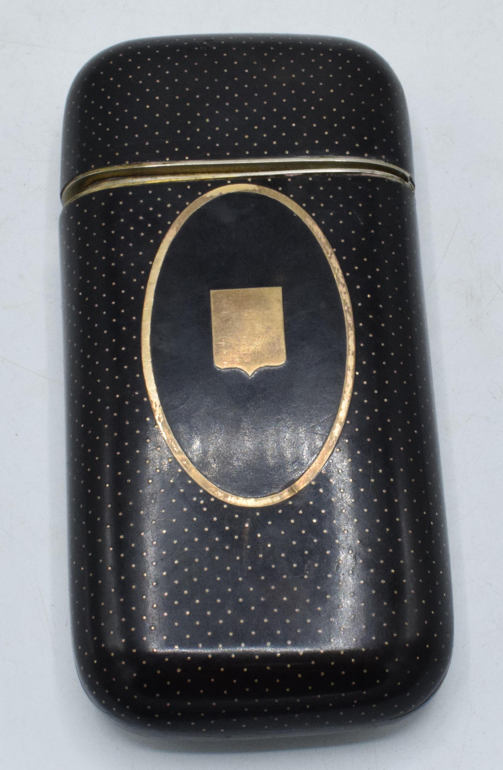 Tortoiseshell and gold pique cigar case with shield inlay, 14.5cm long. Lid doesnt quite close