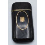 Tortoiseshell and gold pique cigar case with shield inlay, 14.5cm long. Lid doesnt quite close