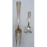 Continental silver two-prong fork together with similar sugar spoon (2), 82.3 grams. 23cm long.