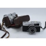 A pair of cameras to include Ilford Sportsman in a carry case together with Olympus Trip 35 in