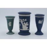 A trio of Wedgwood Jasperware items to include dark blue spill vase, trumpet vase and one similar in