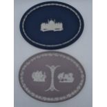 A pair of Wedgwood Jasperware oval plaques to include lilac example and dark blue 'Royal Pavilion
