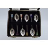 A cased set of 6 silver teaspoons with coloured enamel decoration, 38.3 grams / 1.23 oz.