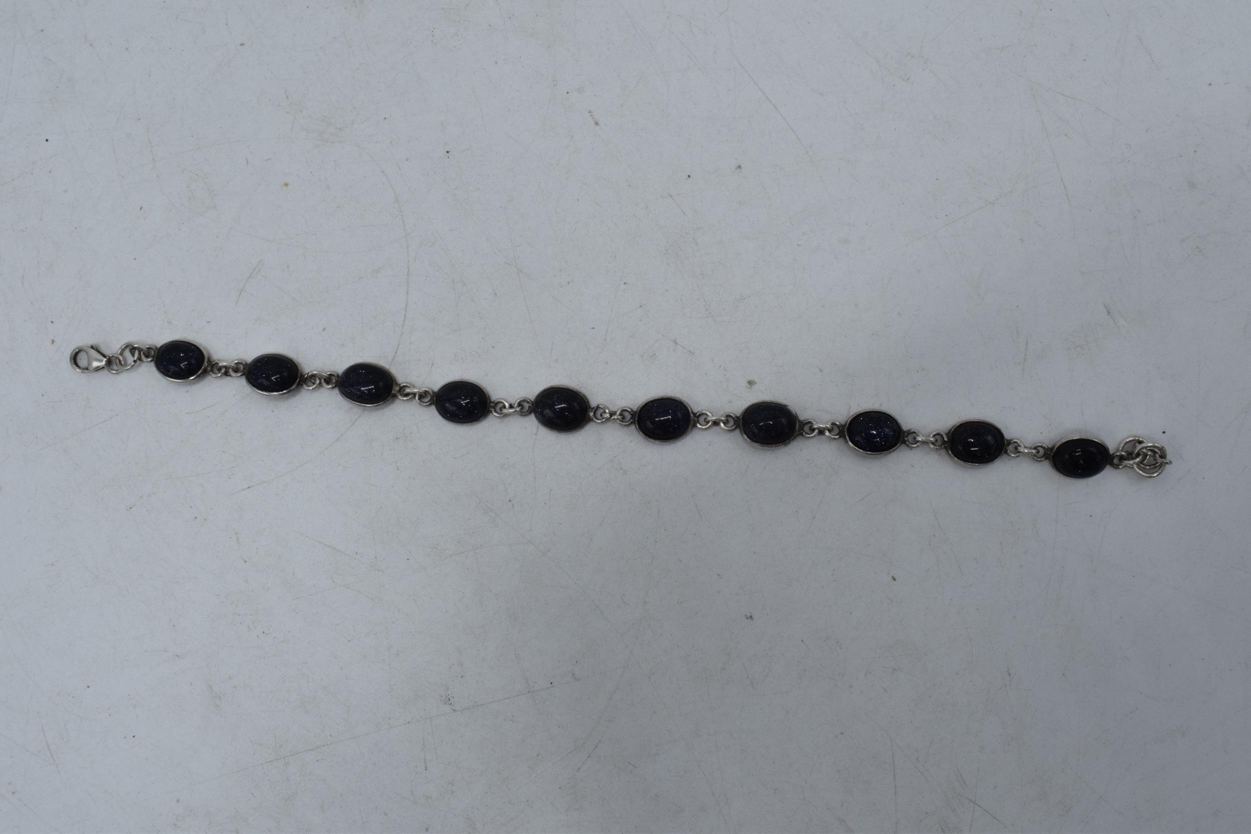 Silver ladies bracelet with blue insets, 20cm long. 7.6 grams. - Image 2 of 2