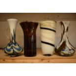 A collection of assorted art / studio glass in the form of jugs and vases (4), tallest 30cm.