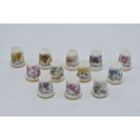 A set of Royal Albert Flower of the Month thimbles, one for each month of the year, January -
