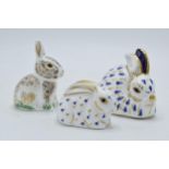 A trio of Royal Crown Derby paperweights to include a Rabbit, Baby Rabbit and Nibbles , first