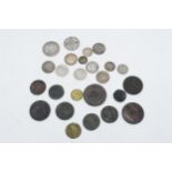 An interesting collection of coins to include silver coins (approx 70 grams) and other similar coins