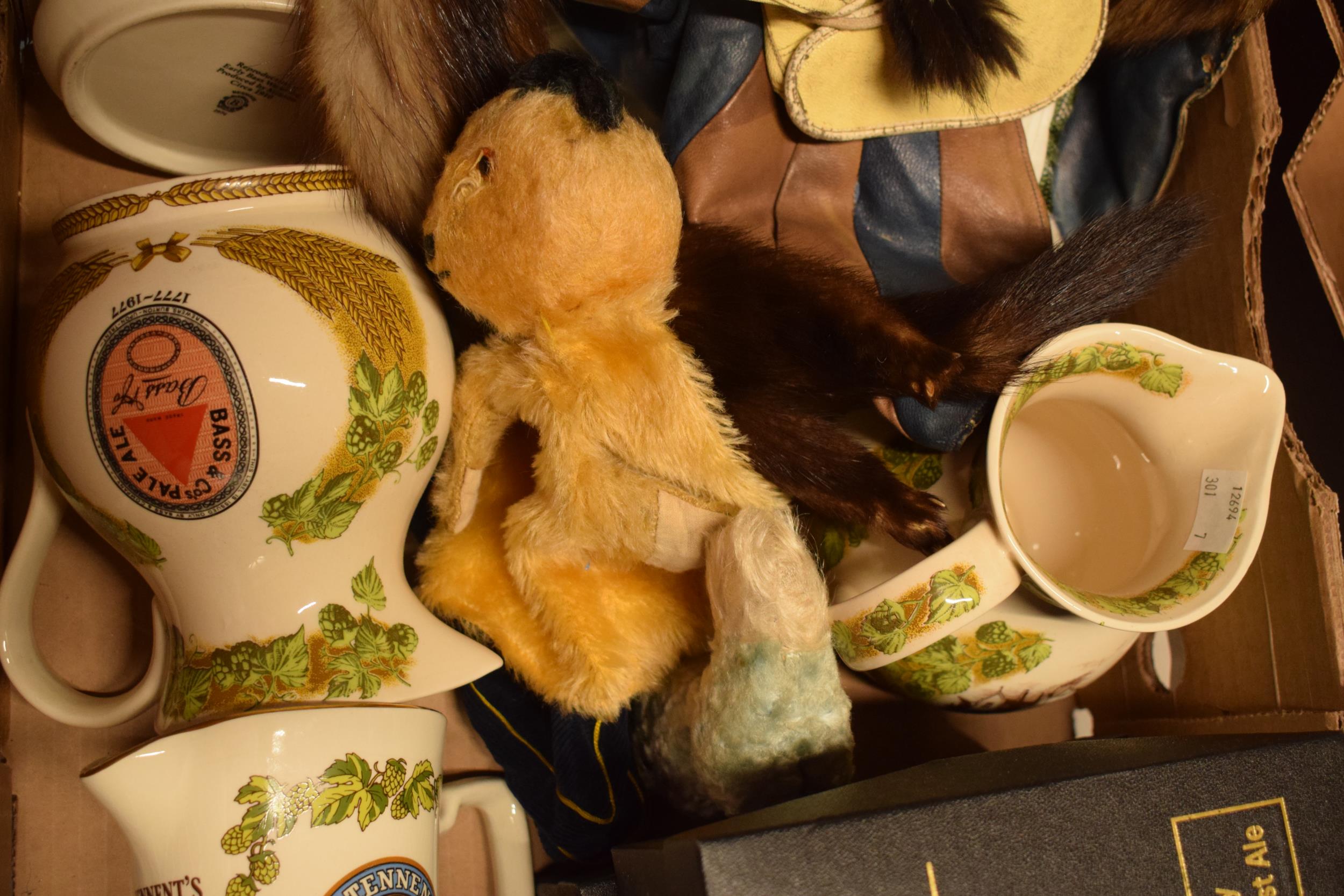 A collection of items to include Bass pub jugs, 1950s Sooty hand puppet, mink stoles and others. - Image 3 of 4