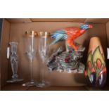 A collection of items to include Waterford champagne flutes with gold trim, Waterford candlestick (