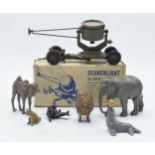 A boxed Britains searchlight on mobile chassis together with similar lead toys to include