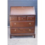 Stag mid-century brown bureau with leather inset to interior. 76 x 46 x 98cm tall. Age-related