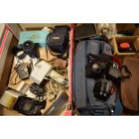 A mixed collection of cameras and accessories to include Canon EOS 750 camera with cover, cary bag