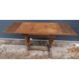 1930s wooden extending dining table with pull out leaves, 165 x 76 x 78 when extended, 105cm when