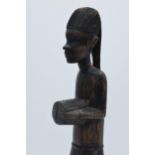 20th century African tribal carving of a figure, 35cm tall.