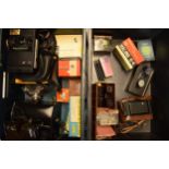 A collection of cameras and accessories to include Kodak EK160-EF, Polaroid Colour Swinger II,