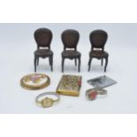 A mixed collection to include Coalport metal chairs (stamped Coalport), compacts, stamp case and