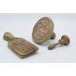 Vintage treen items to include wooden butter stamp with cow decoration and other related items (