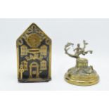 Victorian brass and cast iron money box in the form of a bank with a clock together together with