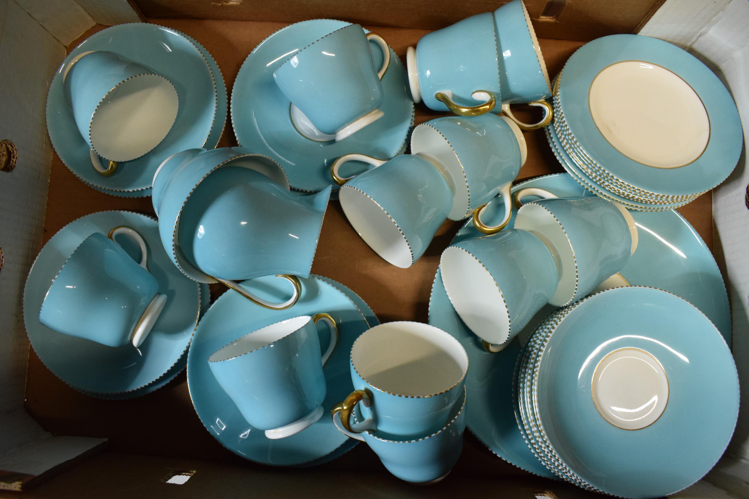 A collection of Wedgwood light blue and gilded tea ware to include 12 cups, 12 saucers, 12 side