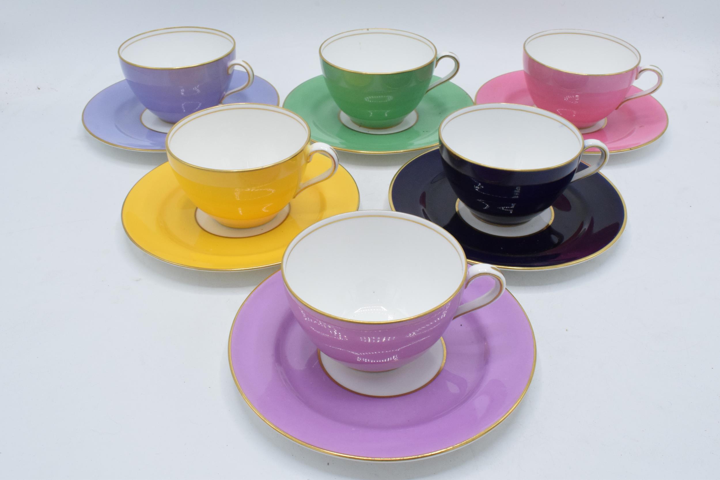 A set of 6 Aynsley multi-coloured duos to include 6 cups and 6 saucers (12). In good condition