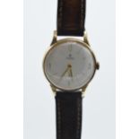 Roidor 9ct gold cased gentleman's wristwatch on leather strap, 36mm wide. Winds, runs and ticks.