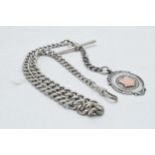 Hallmarked silver Albert watch chain with T-bar and fob, 35.5 grams, 39cm long.