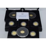 9ct gold coins: a collection of 8 1.0 grams 9ct gold coins to include Queen Elizabeth II Sapphire