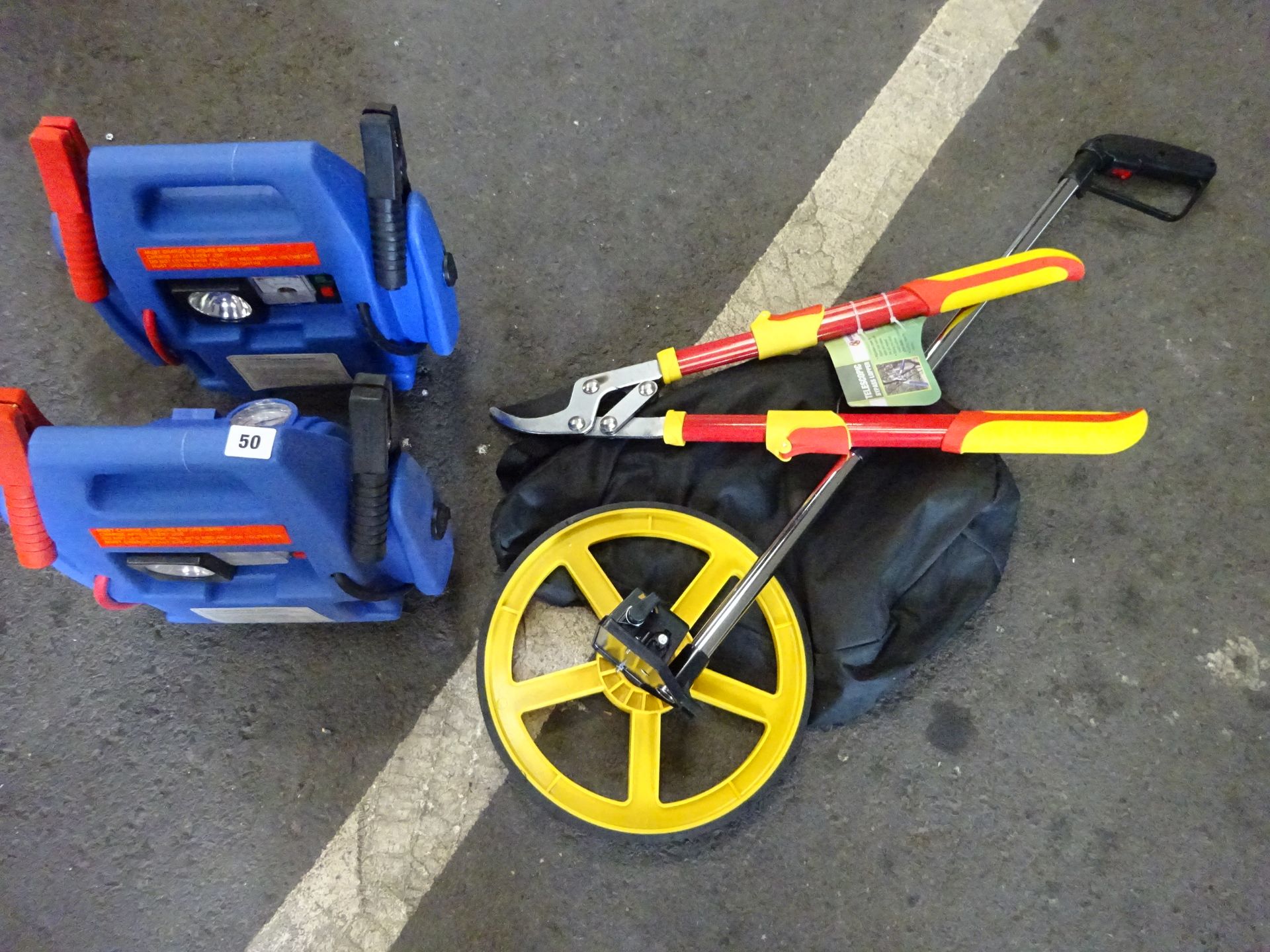 2 JUMP STARTERS, MEASURING WHEEL & BYPASS LOPPERS