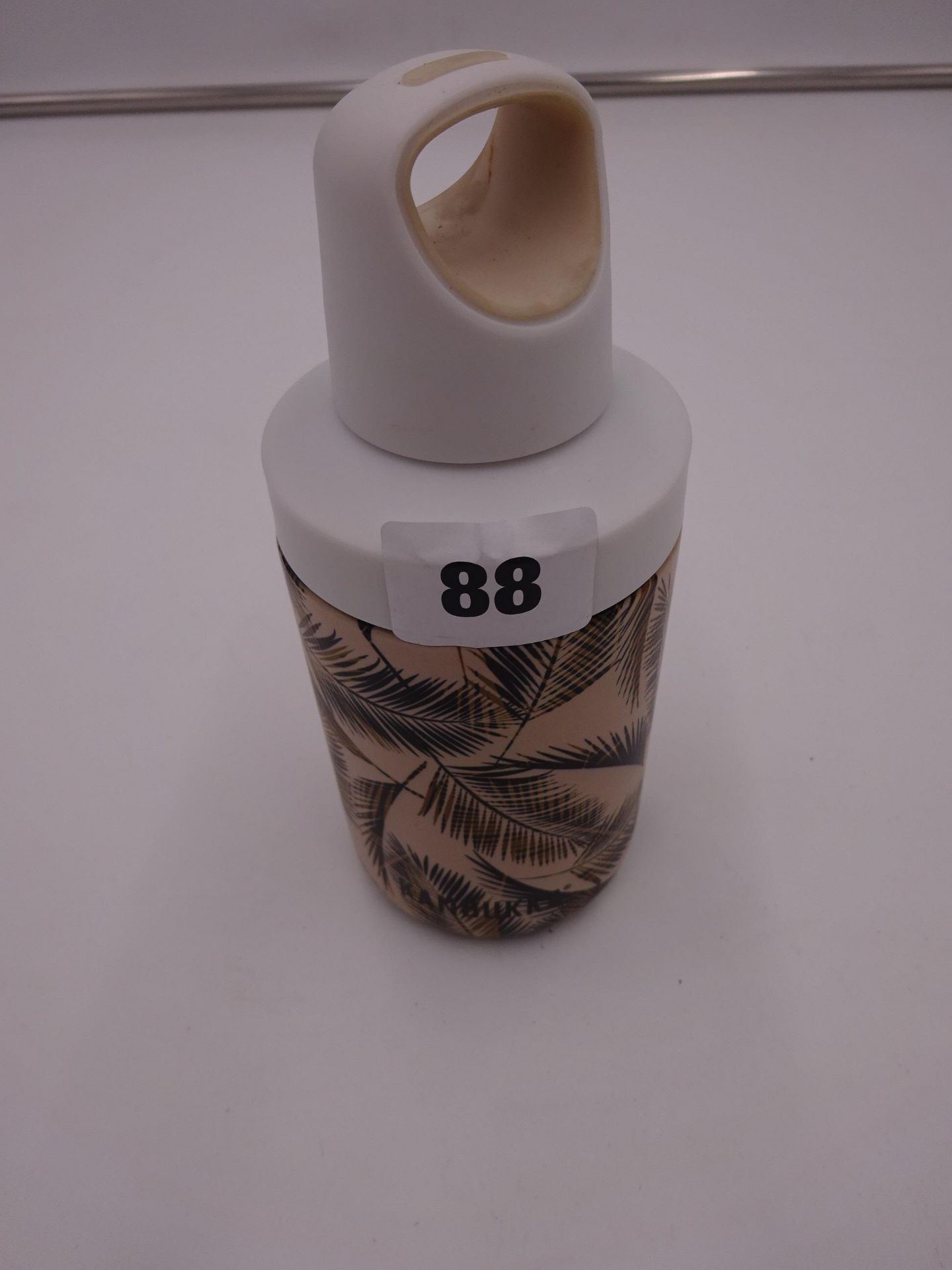 NEW - SMALL LIQUID HOLDER IN PATTERNED BOTTLE