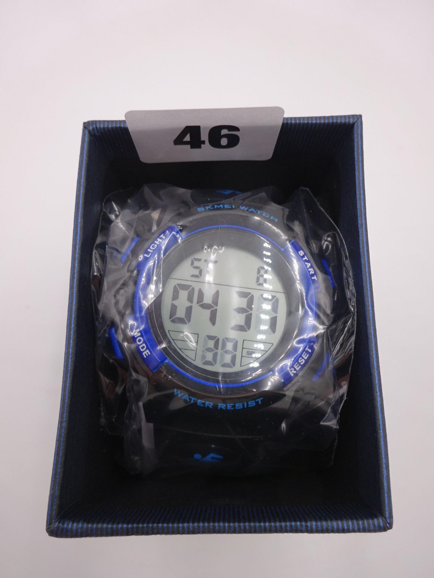 New sport watch water resist black strap with hints of blue digital.