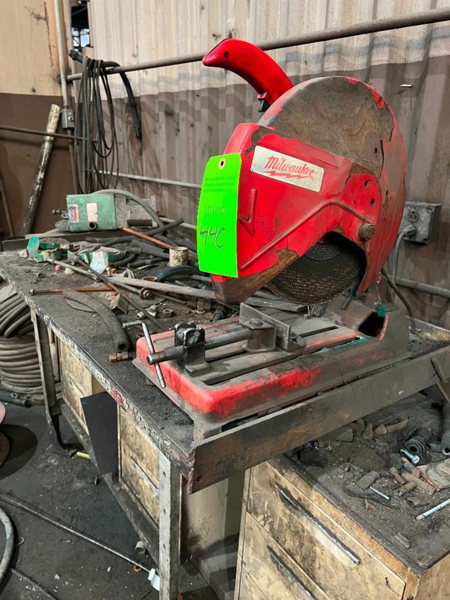 Milwaukee Saw w Steel Table and Cabinets contents
