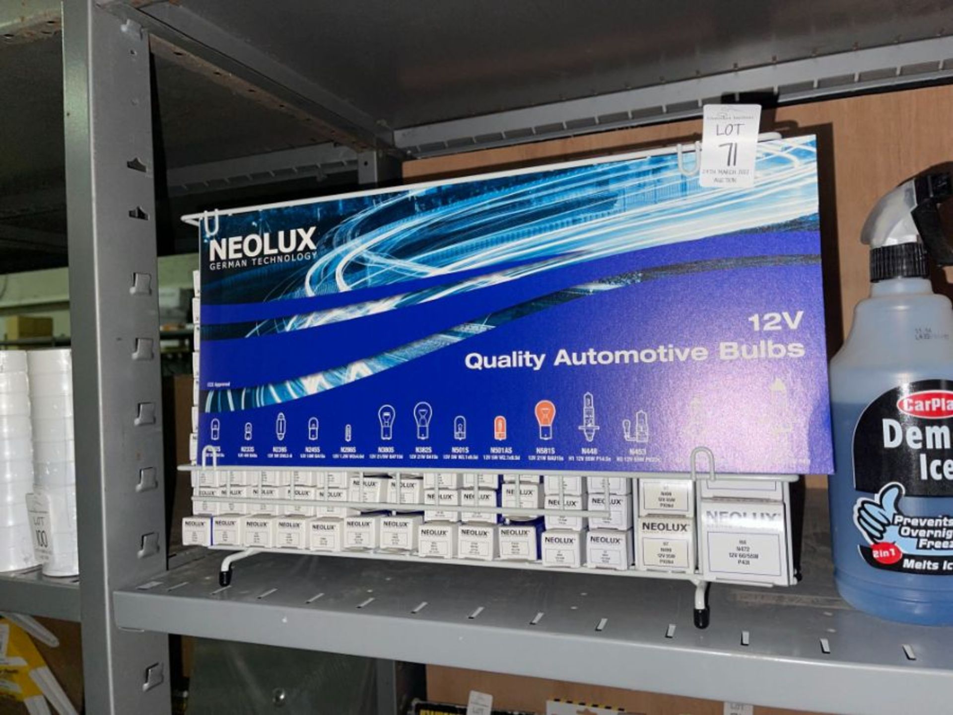 ASSORTED NEOLUX AUTOMOTIVE BULBS ON DISPLAY STAND