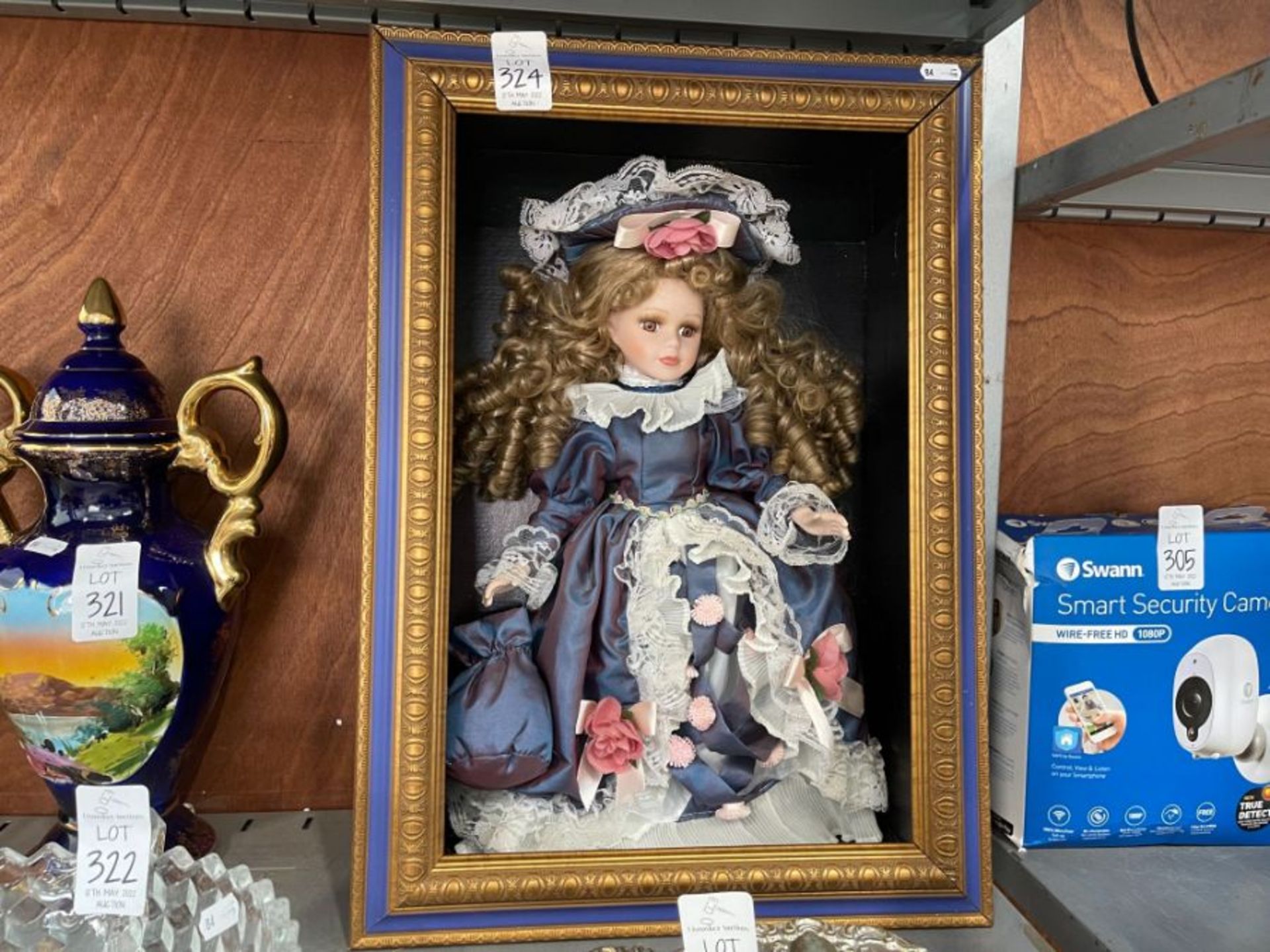 PORCELAIN DOLL IN FRAME