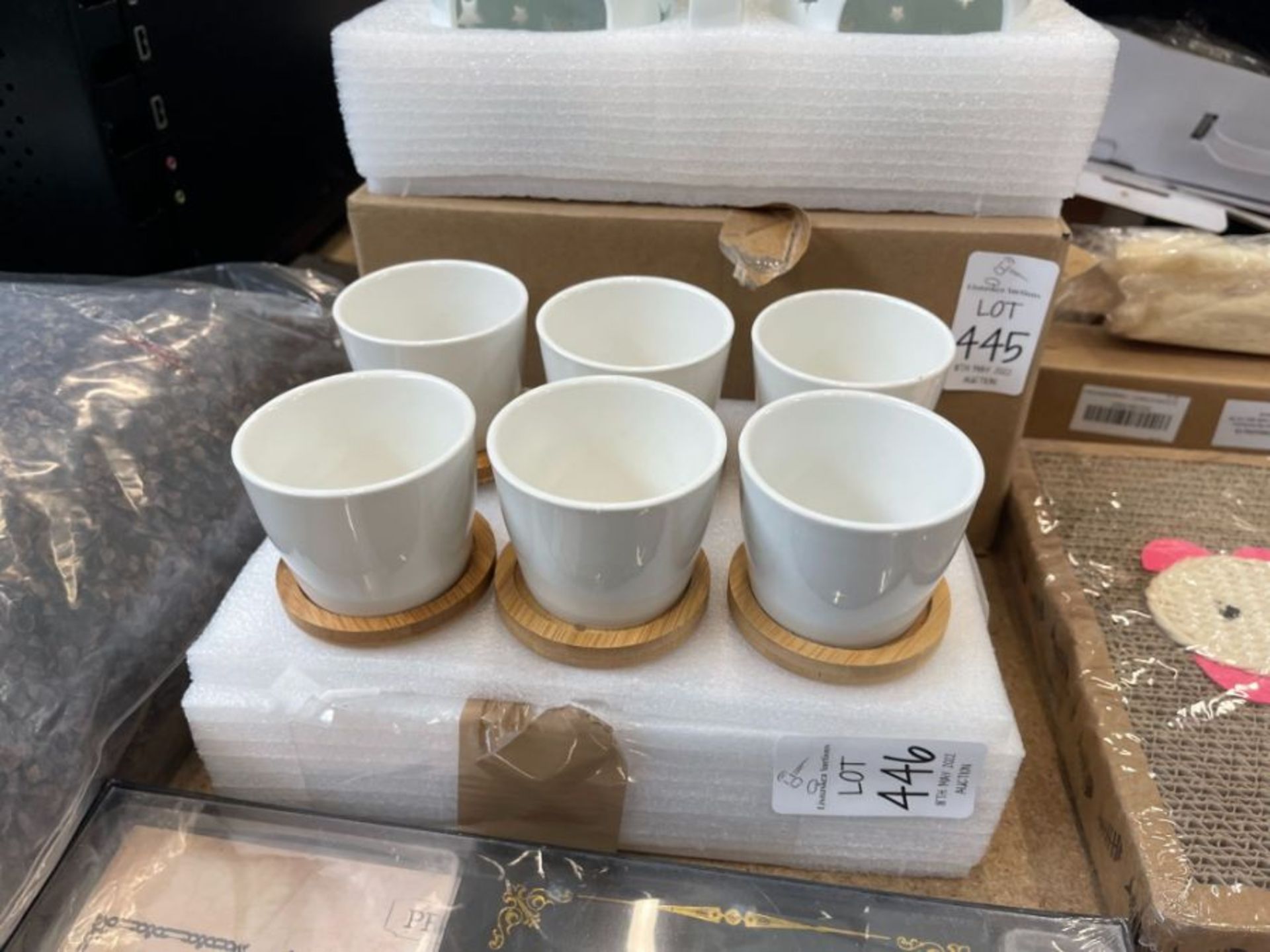 6 LARGE EGG CUPS WITH WOODEN COASTERS