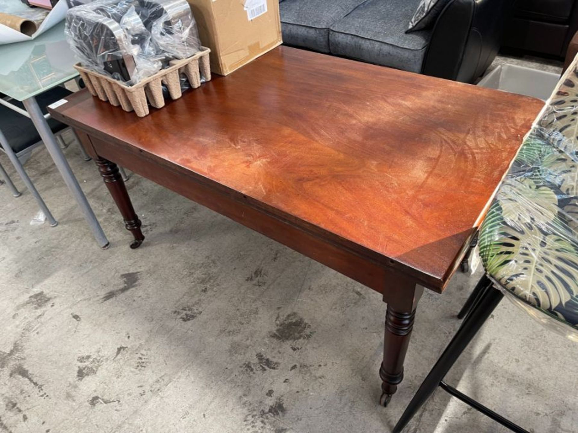 MAHOGANY HALL TABLE ON WHEELS