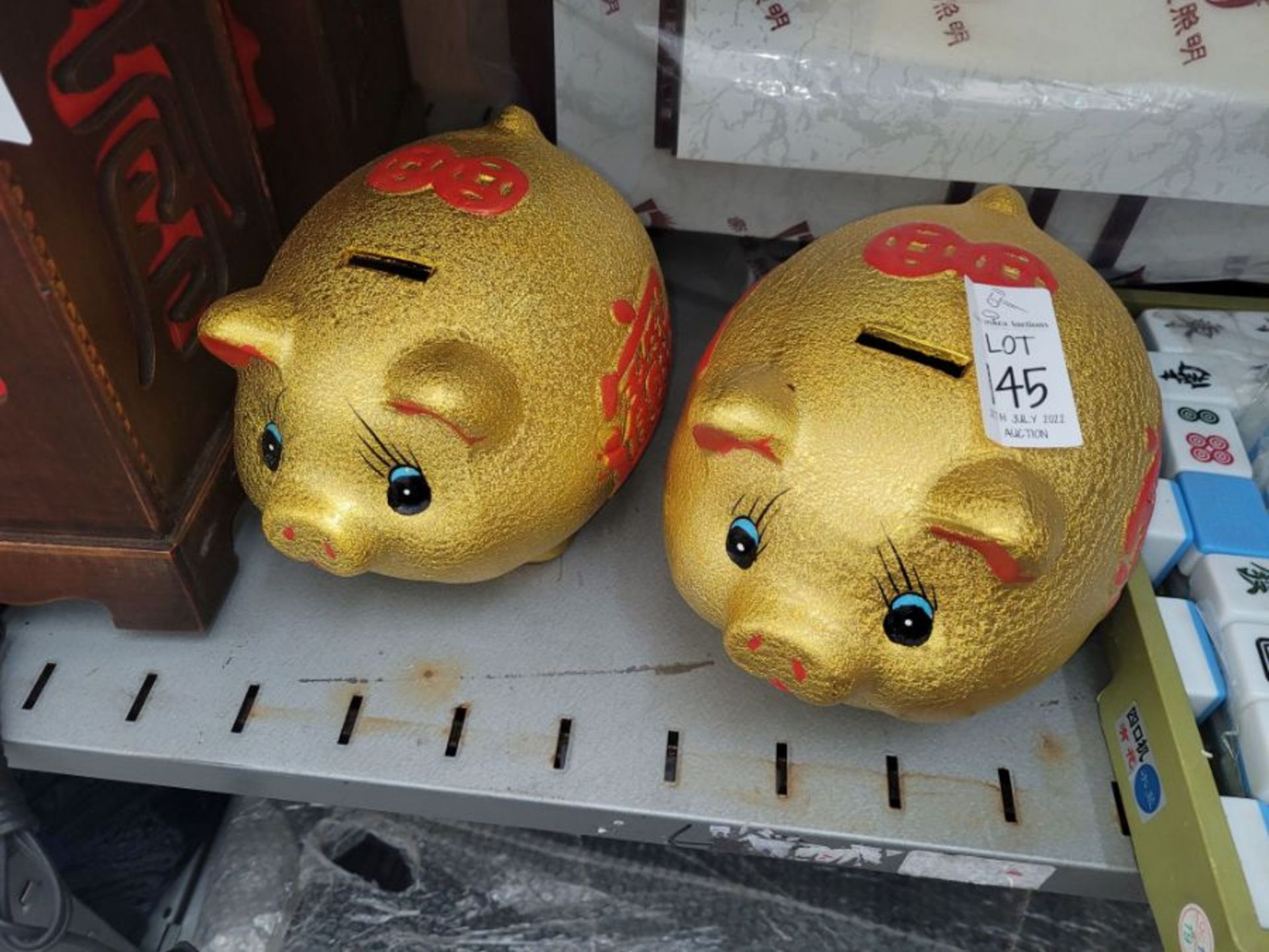 TWO CHINESE PIGGY BANKS