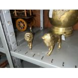 PAIR OF BRASS LION ORNAMENTS