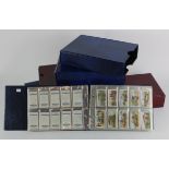 Collection of approx 63 complete sets of cigarette cards contained in 5x modern albums, the majority