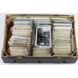 Banana box packed with various mixed postcards, old and modern range. (heavy) Buyer collects