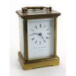 Brass five glass carriage clock by 'Matthew Norman, London', white enamel dial with Roman