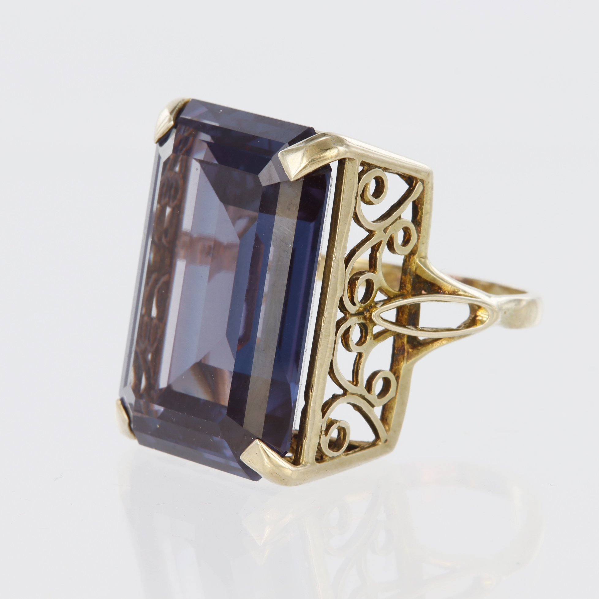 9ct yellow gold dress ring set with large step cut synthetic "alexandrite" measuring approx. 24mm