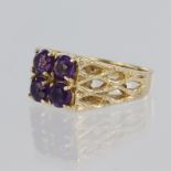 9ct yellow gold ring set with four round amethyst stones measuring approx. 4mm diameter each, set in