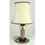 Moorcroft 'Foxglove' table lamp by Rachel Bishop (1994-96).On a circular wooden base with silk