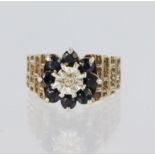 9ct yellow gold cluster ring set with a centre round brilliant cut diamond weighing approx. 0.