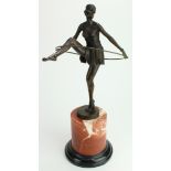 Bronze statuette depicting a semi-nude dancer with hoop. Signed "D Alonzo" On a marble base.